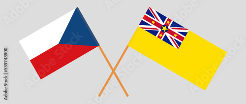Crossed flags of Czech Republic and Niue. Official colors. Correct proportion