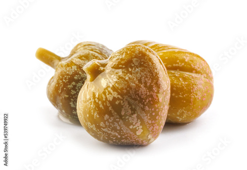 Three capers isolated on white background. Full clipping path.