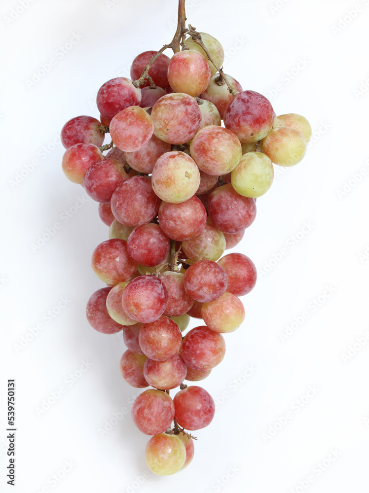 Red fresh grapes isolated on white background Red fresh grapes isolated on white background