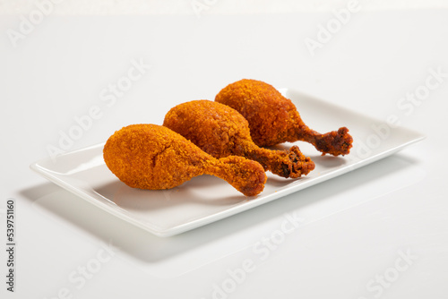 chicken lolipop, chicken winglet, tandoori chicken. Famous indian non veg dish, roasted chicken, indian chinese appetizer photo