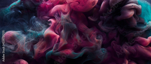 Multicolored dark abstract background, luxury black smoke, acrylic paint underwater explosion, cosmic swirling ink