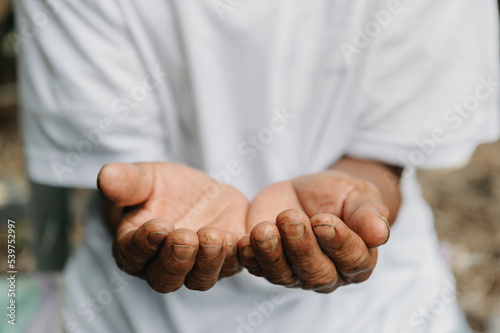 Fotografie, Obraz Close up of male wrinkled hands, old man is wearing..