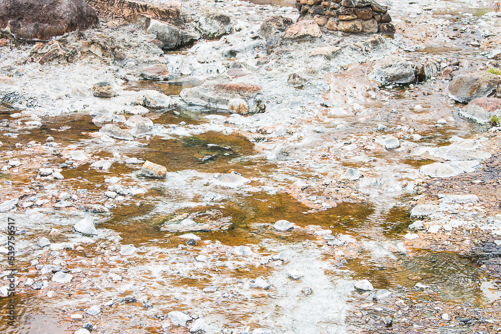 The rocks in the natural hot spring has many minerals. The rocks in the natural hot spring has many minerals.