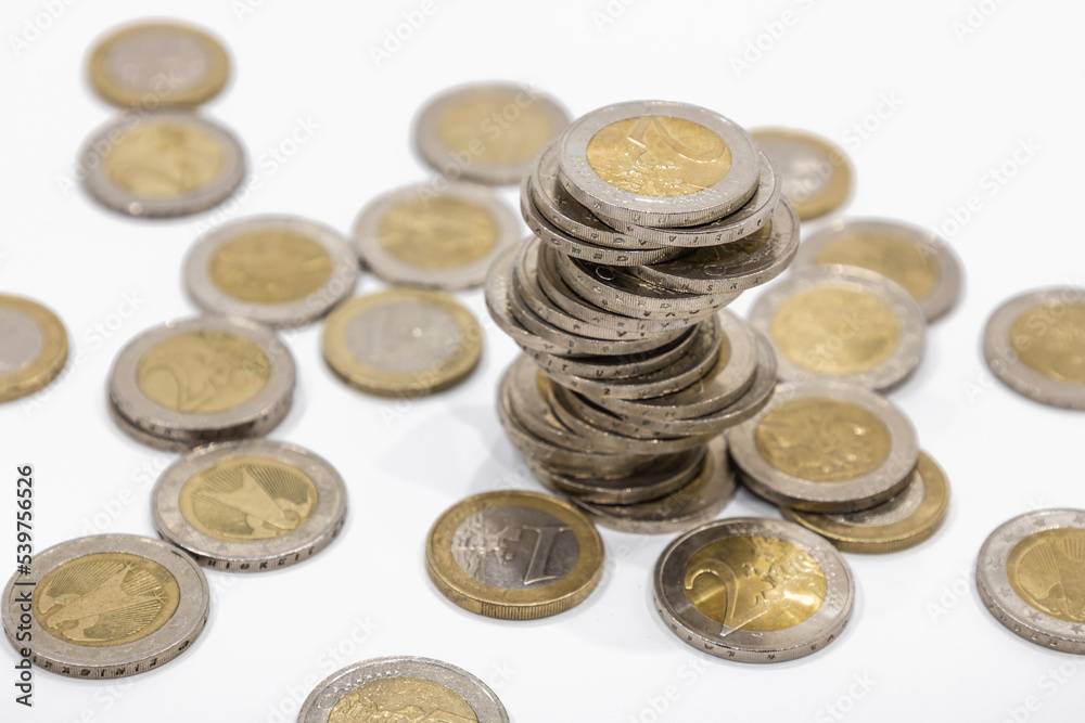 The pile of euro coins. Business, wealth, success, finance, money growth and save money concept The pile of euro coins. Business, wealth, success, finance, money growth and save money concept
