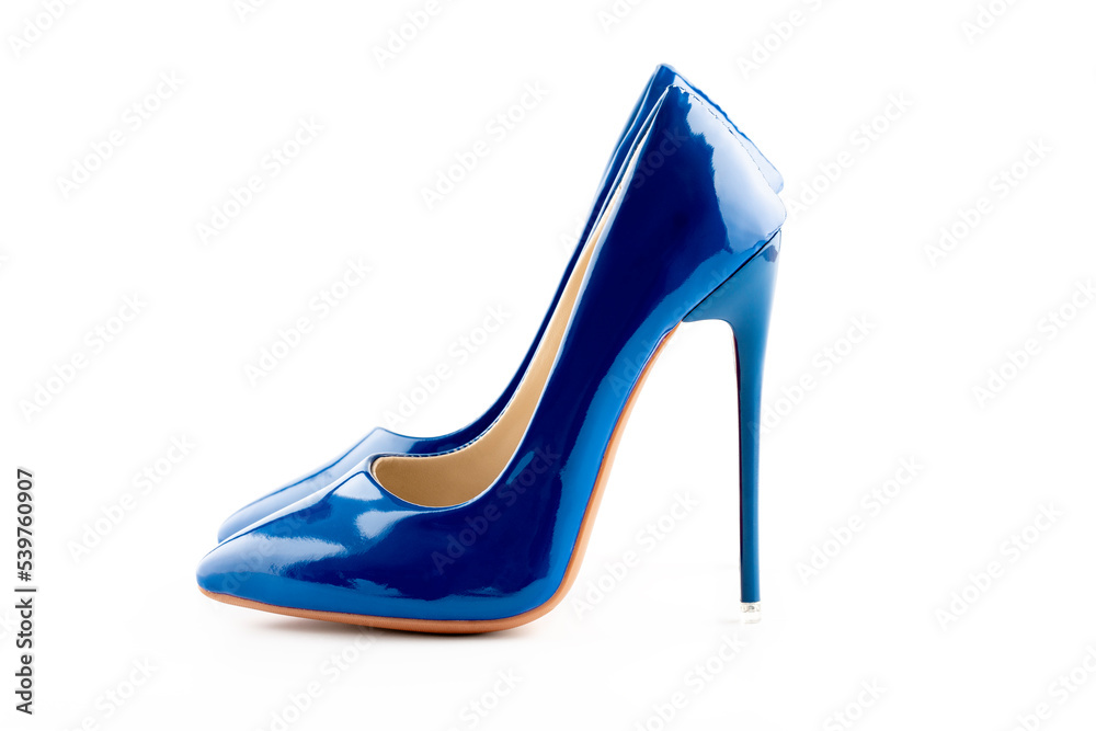 a pair of blue women's high-heeled shoes on white background a pair of blue women's high-heeled shoes on white background