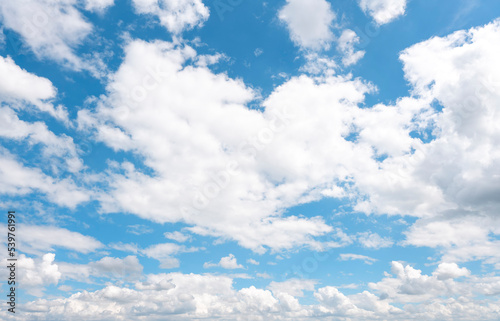 Fototapeta Naklejka Na Ścianę i Meble -  white cirrus, feathery clouds  against spring bright blue cloudy sky  on sunny day in England