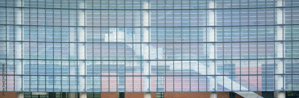 abstract pattern structure of steel decoration with light transparent glass wall texture window panel brick.modern industrial new style smart office building save energy architecture. facade exterior. abstract pattern structure of steel decoration with light transparent glass wall texture window panel brick.modern industrial new style smart office building save energy architecture. facade exterior.