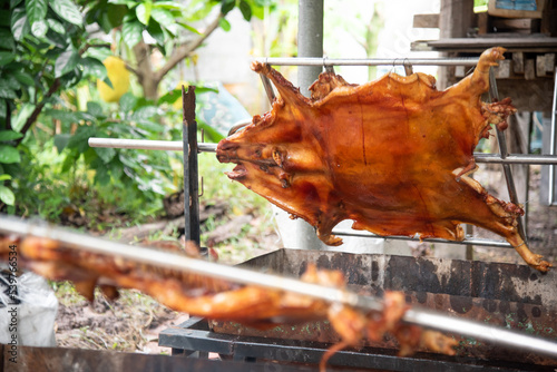 Roasted whole pig, slow grilled pork,  delicious hot food 