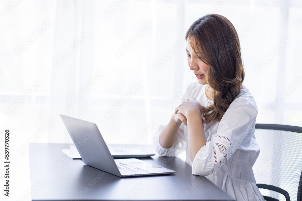 Happiness Entrepreneur beautiful business asian young woman working with laptop at workplace, Small Business Startup, online banking tax, accounting, financial concept. Happiness Entrepreneur beautiful business asian young woman working with laptop at workplace, Small Business Startup, online banking tax, accounting, financial concept.