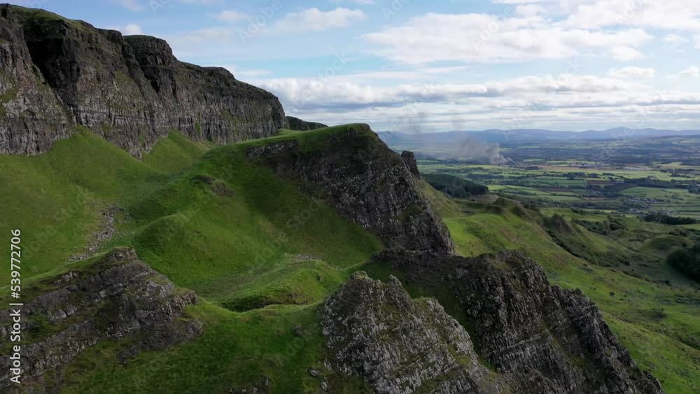 The beautiful Binevenagh mountain near Limavady in Northern Ireland, United Kingdom The beautiful Binevenagh mountain near Limavady in Northern Ireland, United Kingdom