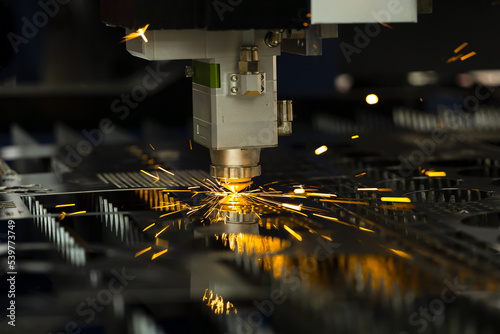 Cnc milling machine. Processing and laser cutting for metal in the industrial. Motion blur. Industrial exhibition of machine tools.