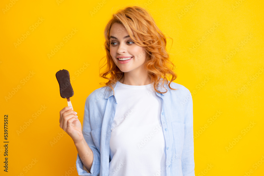 Girl posing with chocolate ice cream on yellow isolated background. Summer woman. Girl posing with chocolate ice cream on yellow isolated background. Summer woman.