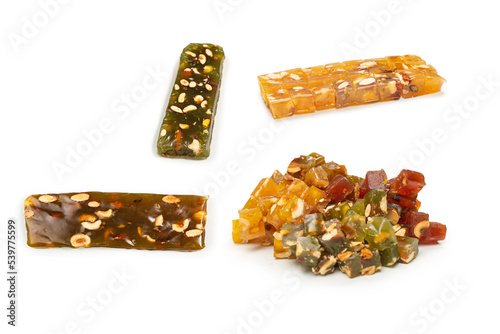 Turkish traditional delight with nuts isolated on white background. © Nikolay