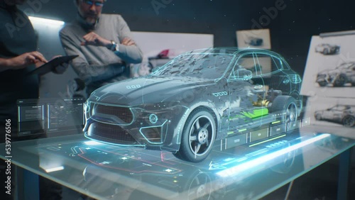Two male engineers using digital tablet App, developing 3D model of a sustainable eco friendly electric vehicle. Designers testing car bodys air streamline properties testing aerodynamic parameters