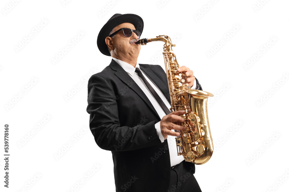 Fototapeta premium Mature man with sunglasses playing a saxophone