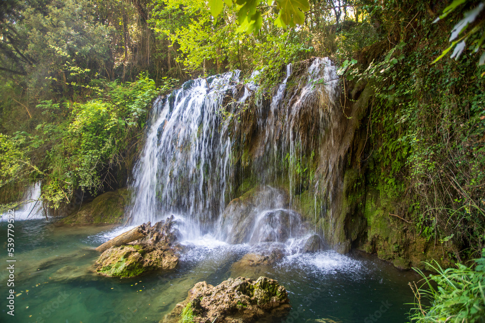waterfall in the volcanic area of Garrotxa, Spain