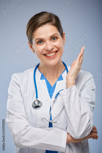 Smiling young doctor woman isolated close up face portrait.