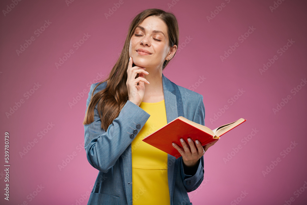 Thinking school teacher woman with eyes closed holding book. Isolated advertising portrait. Thinking school teacher woman with eyes closed holding book. Isolated advertising portrait.