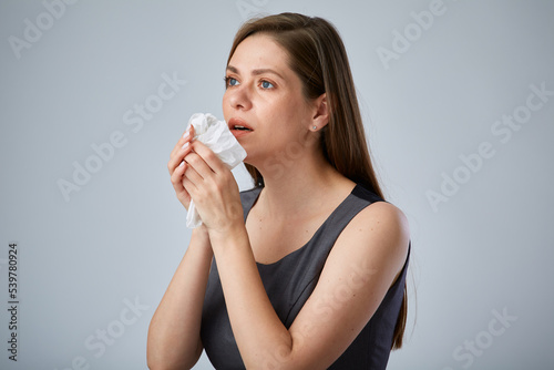 Sick coughing business woman using napkin. isolated advertising portrait.