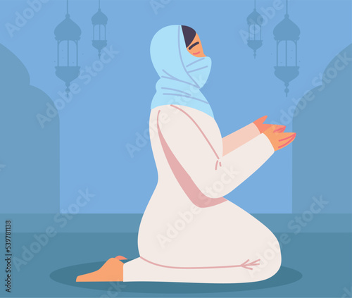 muslim woman in a hijab praying