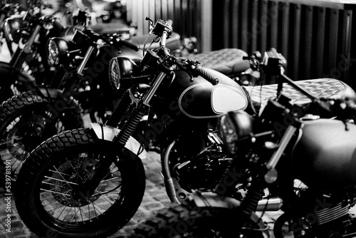 Motorbikes in black and white ready to go
