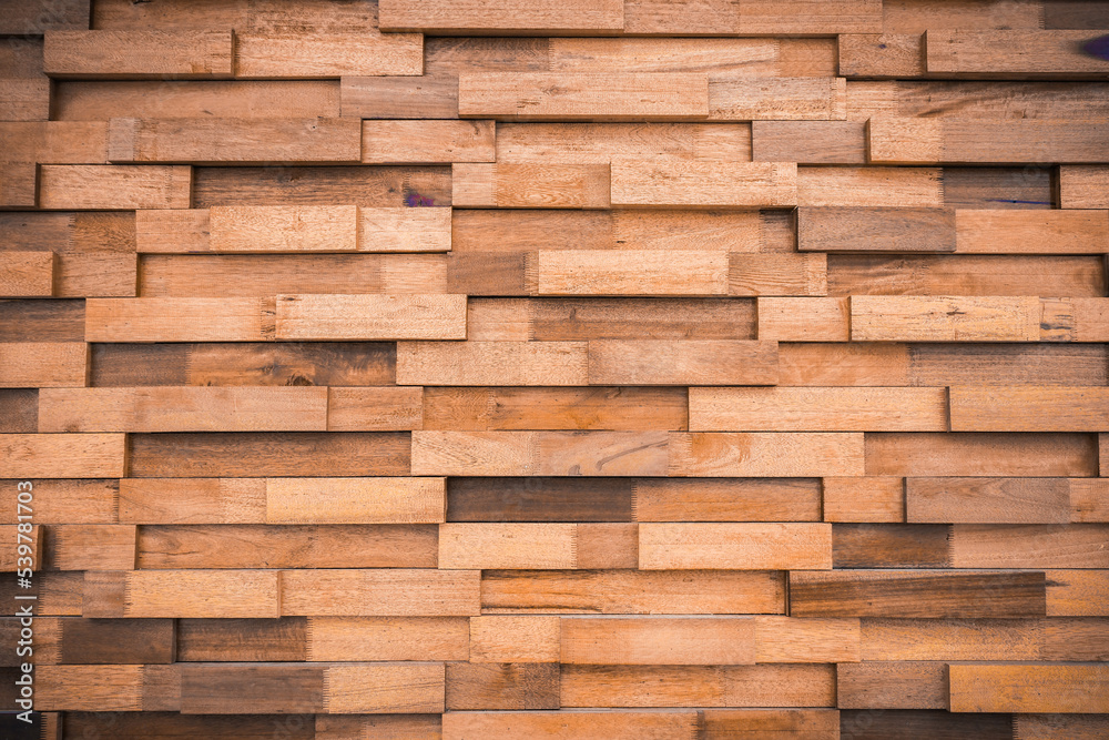 Textured background of horizontal brown plank wall
stacked together in layers. wooden wall background Textured background of horizontal brown plank wall
stacked together in layers. wooden wall background