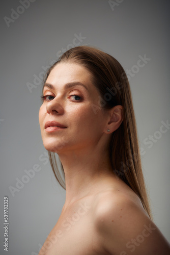 Beauty style isolated female portrait with bare shoulders.