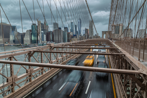 Moving cars on the Brooklyn Bridge, New York street life