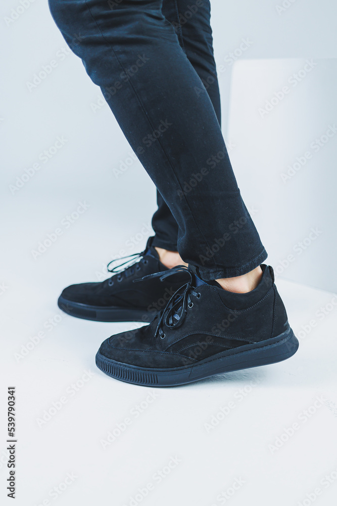 Men's casual shoes in black color made of genuine leather, men on shoes in black lace shoes. High quality photo Men's casual shoes in black color made of genuine leather, men on shoes in black lace shoes. High quality photo