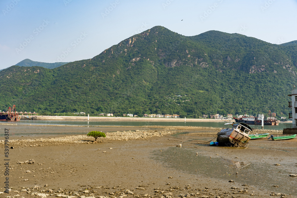 A boat on a beach in Tai O
