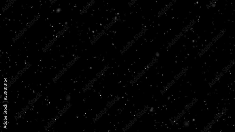 Realistic snowflakes falling down looped animation on clean black copy space background. Realistic snowflakes falling down looped animation on clean black copy space background.