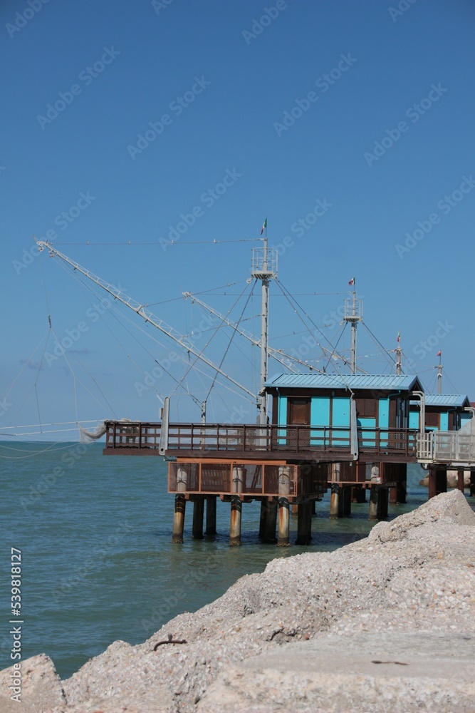 Italy, Marche, Fano: Wooden constructions on the water, called Trabucchi.