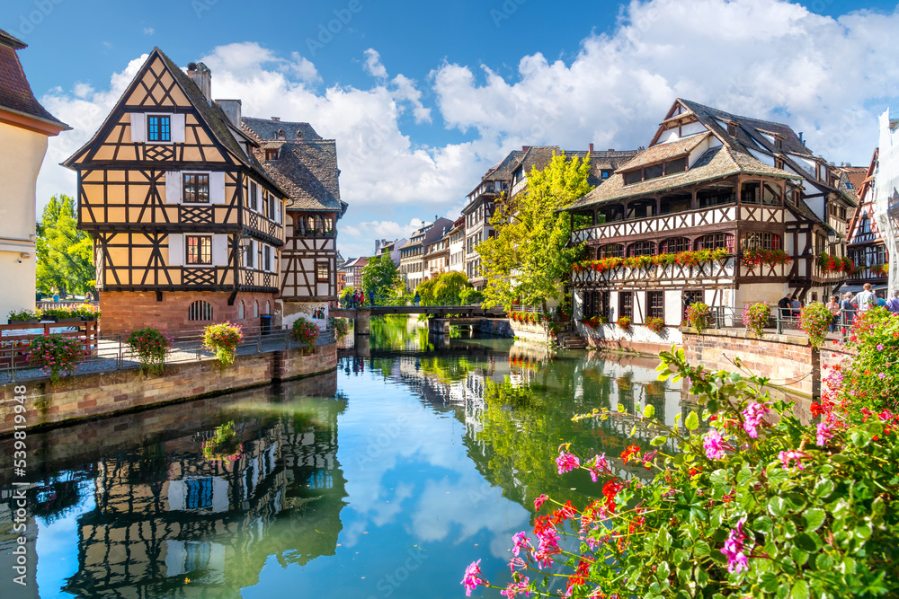 Picturesque half timbered buildings and the Maison des Tanneurs (tanners house) in the Petite France canal zone along the Ill river in the historic city of Strasbourg, in the Alsace region of France.