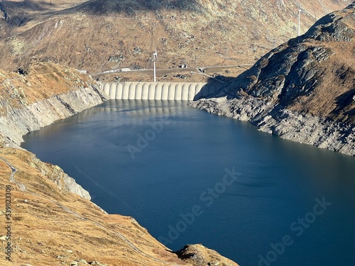 Artificial reservoir lake Lago di Lucendro or accumulation lake Lucendro in the Swiss alpine area of the St. Gotthard Pass (Gotthardpass), Airolo - Canton of Ticino (Tessin), Switzerland (Schweiz) photo