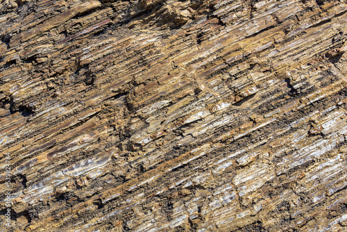 background, texture of layered brown rock