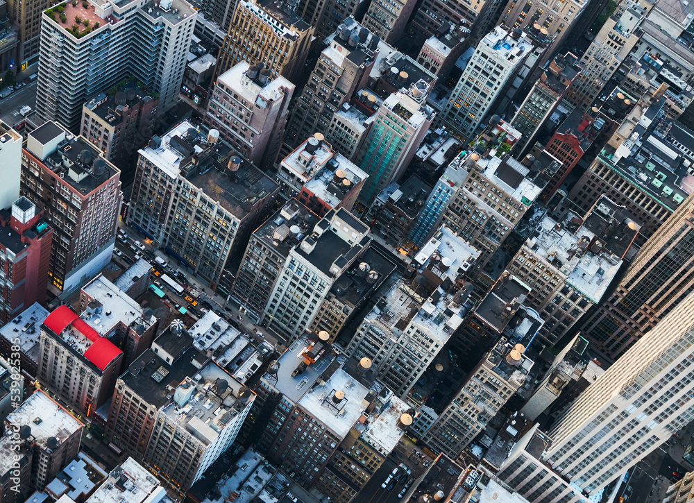 Fototapeta premium View of a cityscape at dusk from above in color