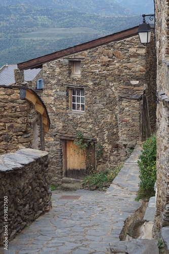 Traditional stone house in village of Jujols, located in Pyrenees mountains, southern France photo