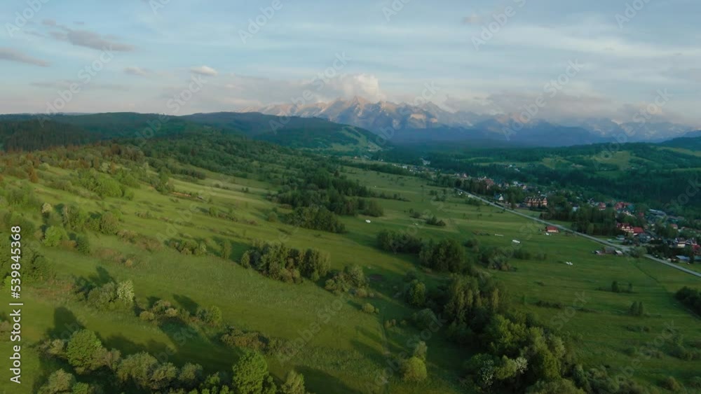 Aerial view of a summer mountain landscape with rocky peaks. Tatra Mountains Aerial view of a summer mountain landscape with rocky peaks. Tatra Mountains