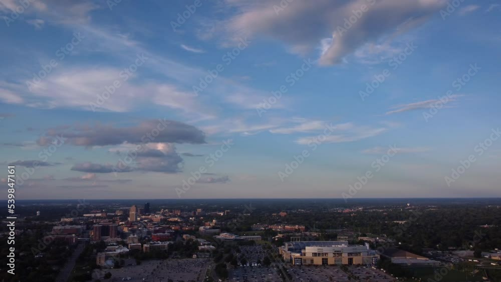Starting from drone view of downtown district of Lexington, KY and panning towards University of Kentucky campus and parks in the East part of the city. Starting from drone view of downtown district of Lexington, KY and panning towards University of Kentucky campus and parks in the East part of the city.