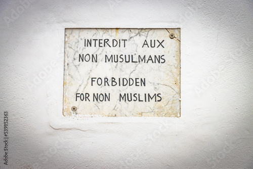old wall street sign, forbidden for non muslims, kasbah of the udayas, rabat, morocco, north africa,