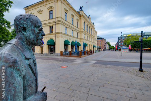 The Gustaf Fröding statue in Karlstad city center, view of stora torget square and the town hall rådhuset photo