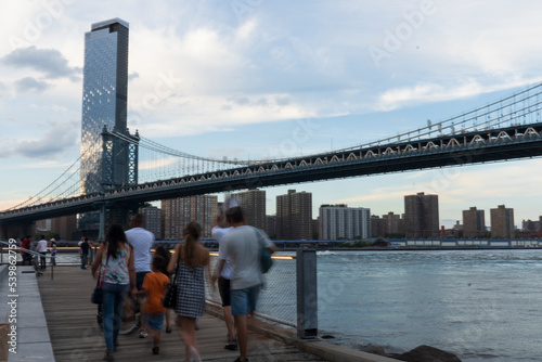 Empire Fulton Ferry promenade area in Brooklyn Bridge Park. Located between the historic Manhattan and Brooklyn Bridges. Seen here is the Manhattan Bridge. © Catrina