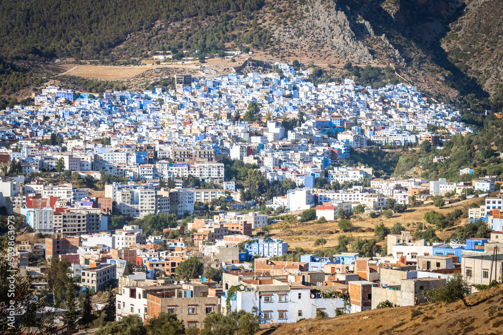 panorama view over blue city of Chefchaouen, morocco, north africa, rif mountains
