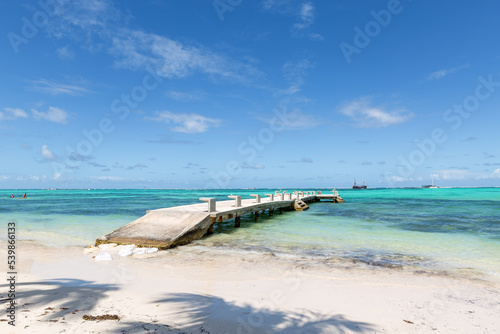 Bavaro beach in sunny day with calm ocean and white beach, Dominican republic