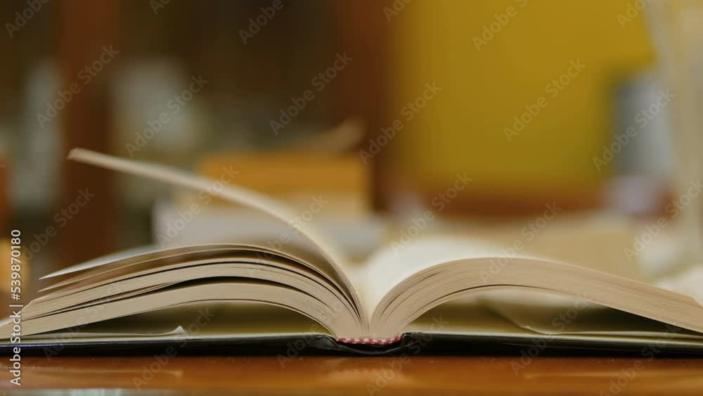 Isolated Book pages turning on,knowledge read concept,home laisure lifestyle Isolated Book pages turning on,knowledge read concept,home laisure lifestyle