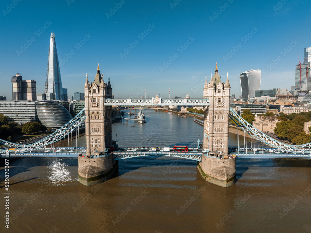 Aerial panoramic cityscape view of London and the River Thames in England, United Kingdom. The iconic Tower bridge - the symbol of London