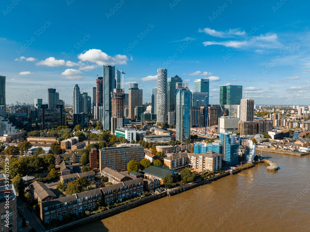 Aerial panoramic skyline view of Canary Wharf, the worlds leading financial district in London, UK. Business center of London.
