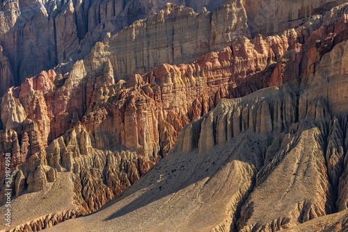 Beautiful sandstone cliffs near Ghami Village in the Himalayas in Nepal photo