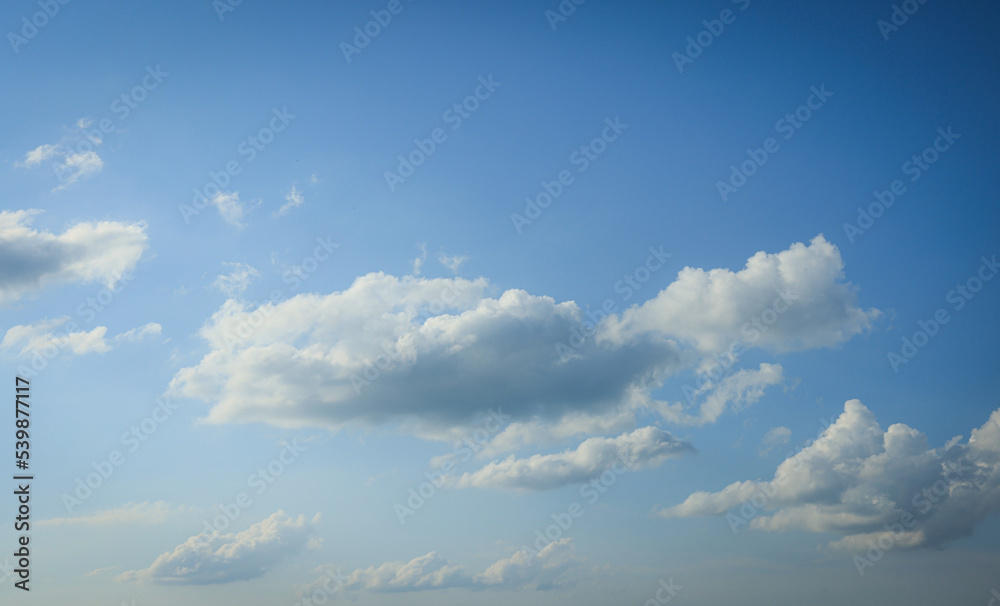 Beautiful blue sky with fluffy white clouds Beautiful blue sky with fluffy white clouds