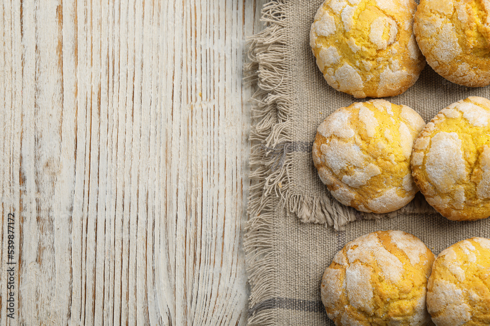 Delicious lemon cookies on wooden table, flat lay. Space for text Delicious lemon cookies on wooden table, flat lay. Space for text